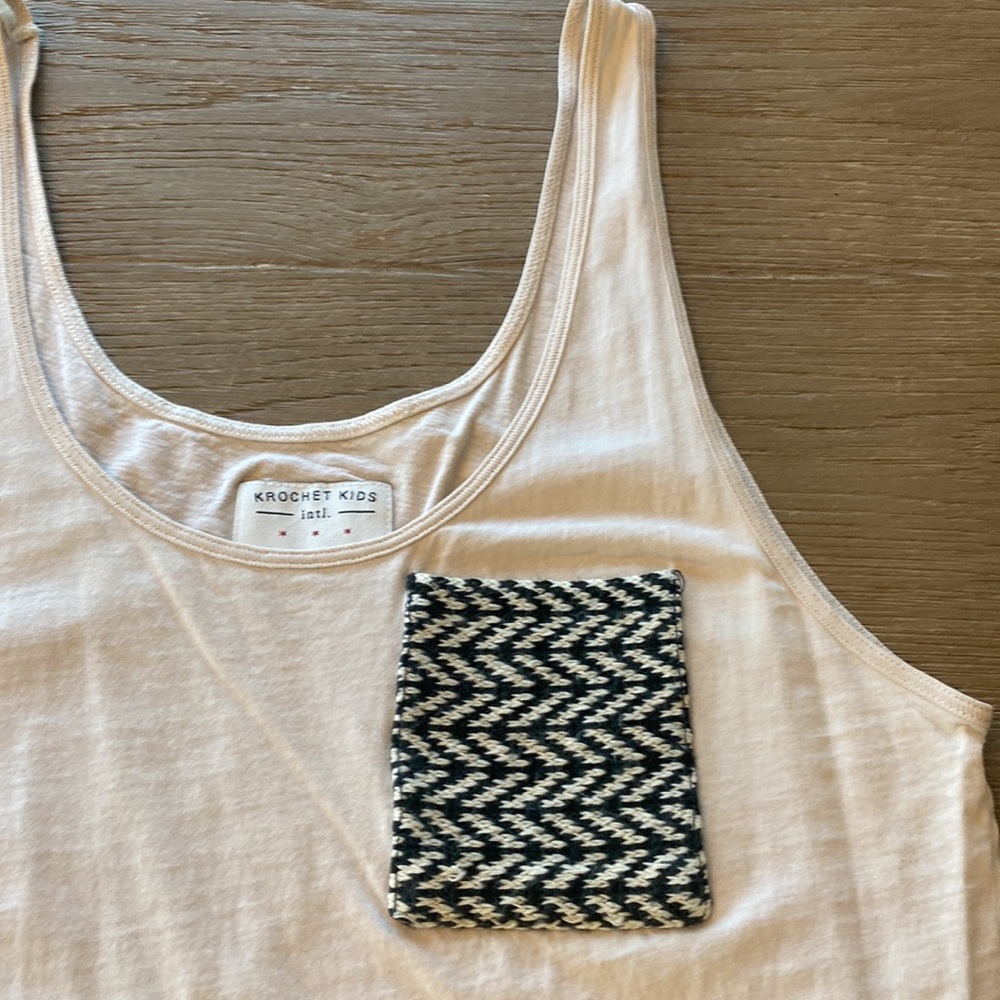 Boutique tank. Stitched pocket